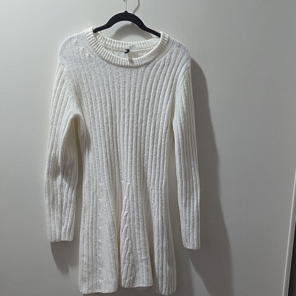 White Ribbed Knit Dress With Flared Skirt.